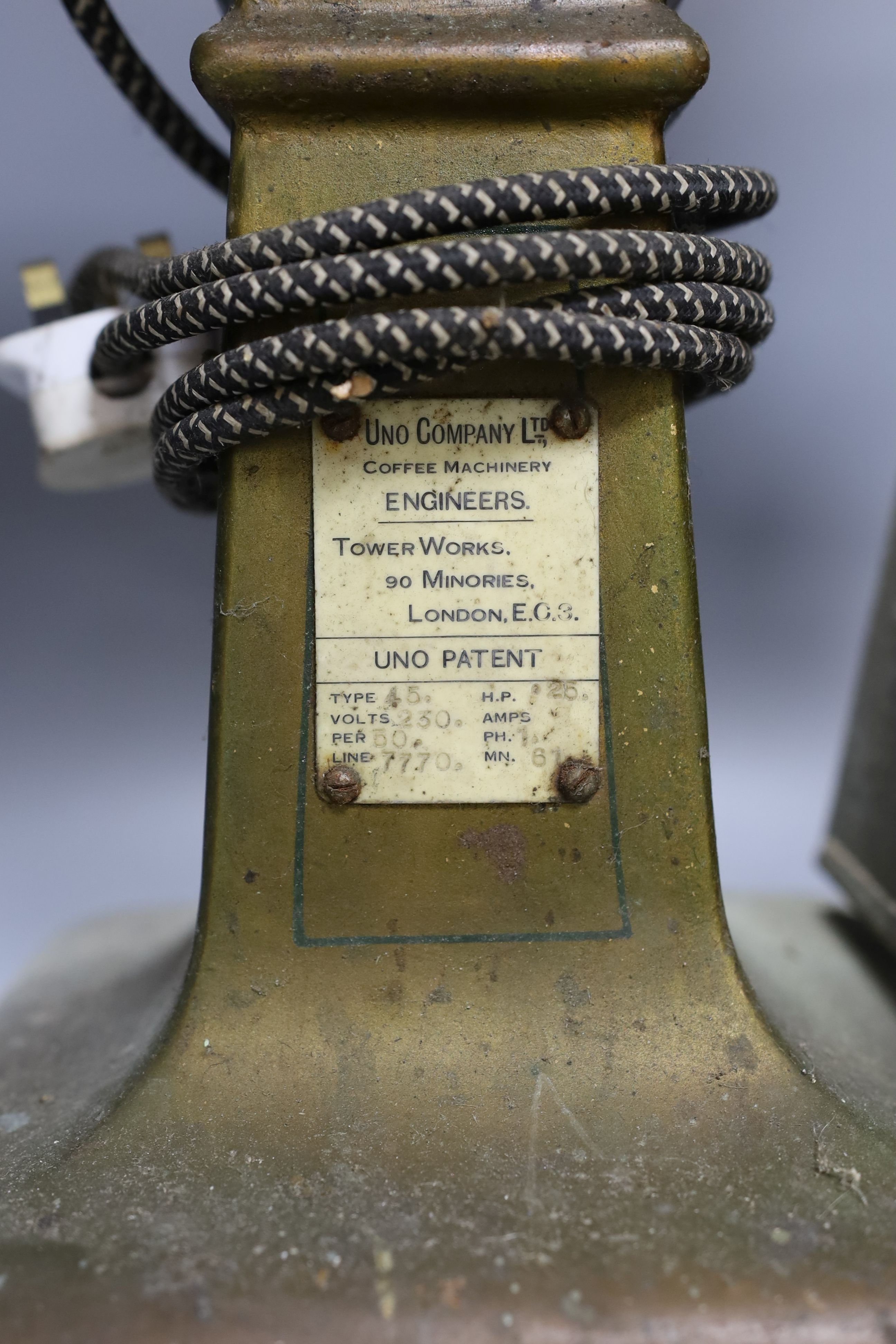 A vintage Uno Company Ltd. type 45 coffee grinder, 78cm tall